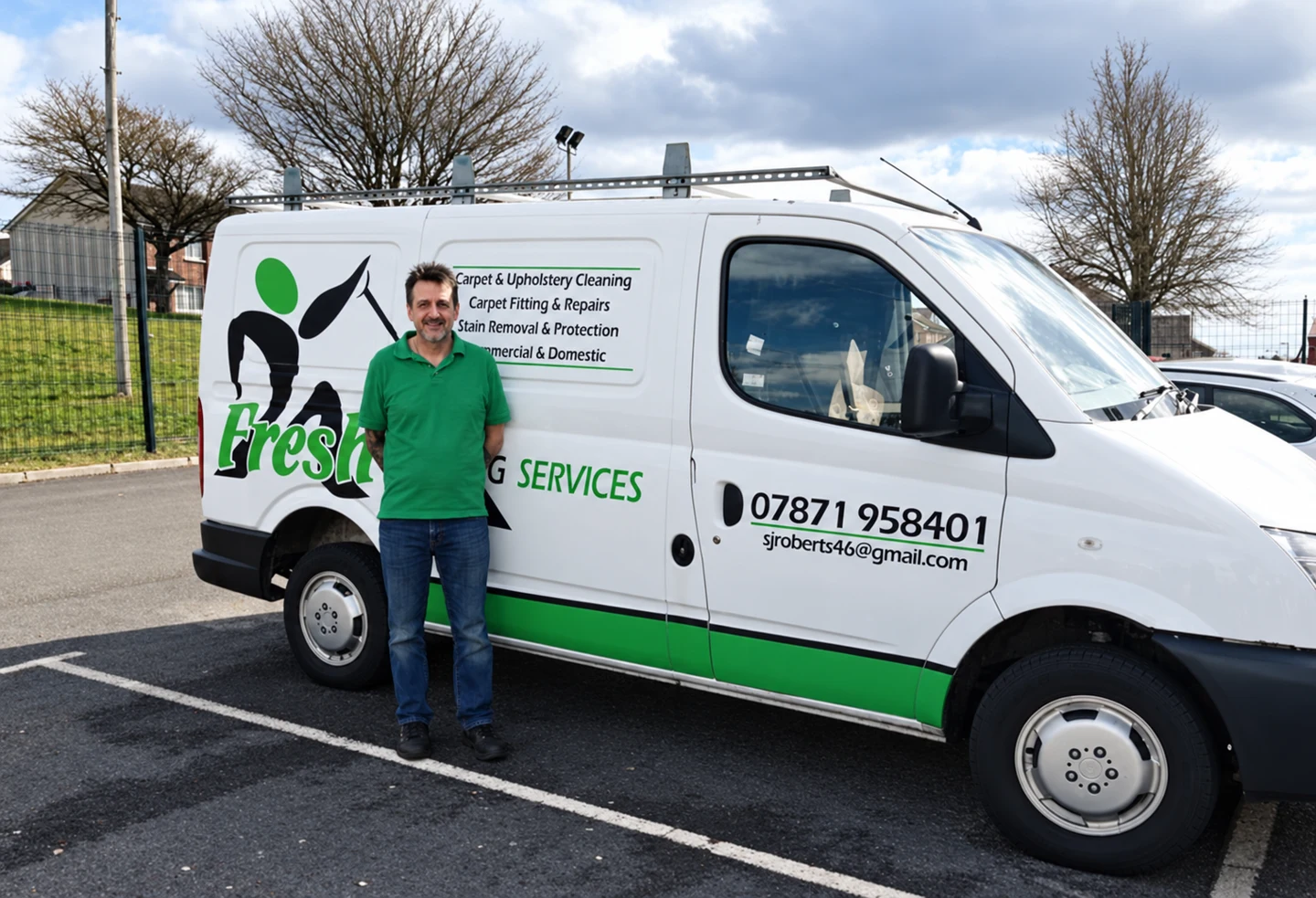 Stevie standing beside his Fresh Carpet Care van